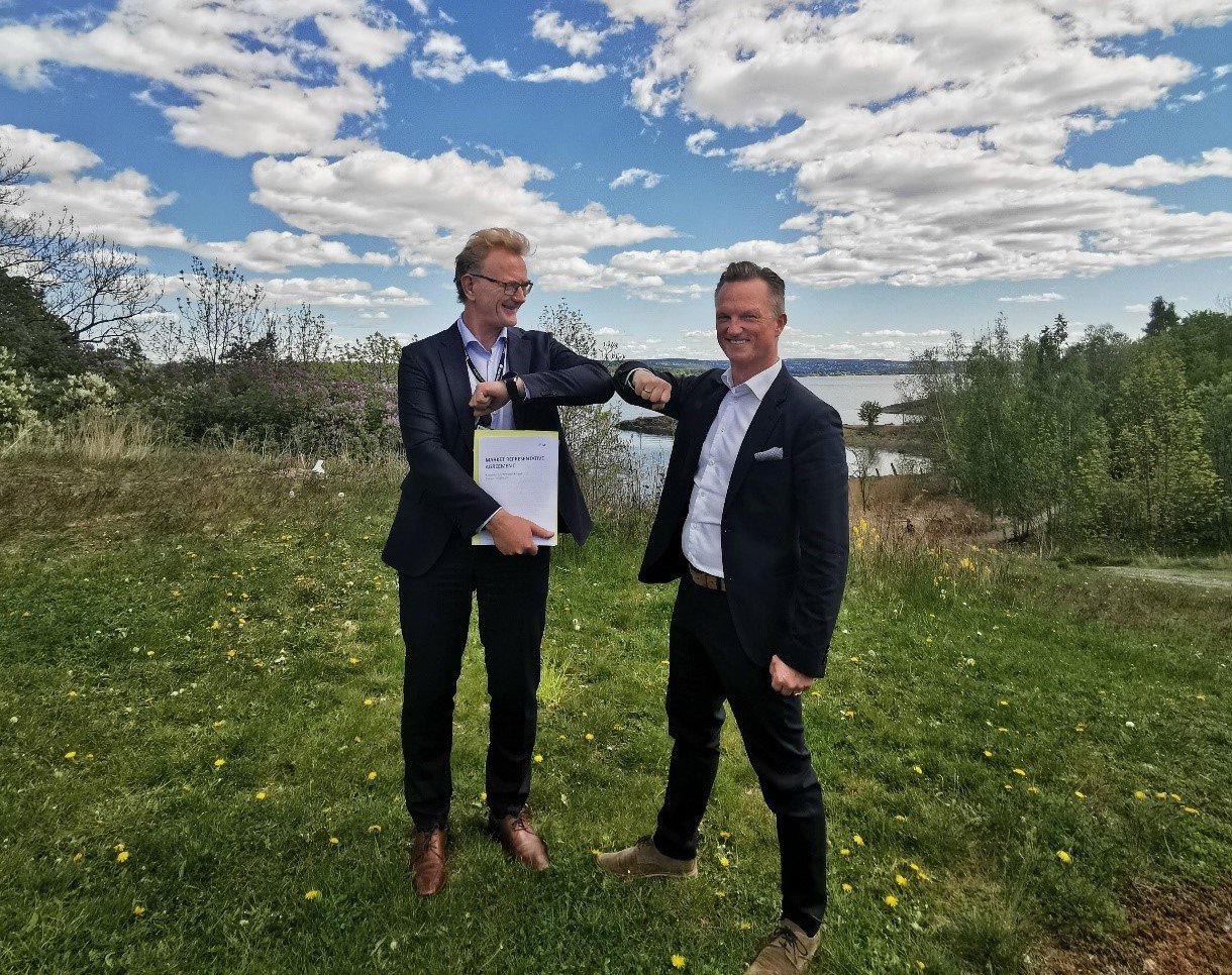 Partnership Handshake Are FÃ¸llesdall TjÃ¸nn and Christian Hartmann crpd